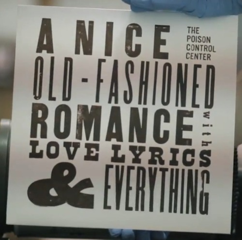 Today is the day! The Poison Control Center’s A Nice Old Fashioned Romance With Love Lyrics and Everything is out today!  Way over half of the copies are already gone!  But I know that ZZZ Records in Des Moines, Vinyl Cafe in Ames, and Record Collector in Iowa City will have some copies!  Also Where It’s At, in Ames has a special copy 2 of 150 signed by all the current PCC members and Avalan Wilson the artist behind the package!  
We are super excited about this record coming out today!  Thanks to everyone from Maximum Ames Records and all of you who have bought the record!
http://maximumamesrecords.com/